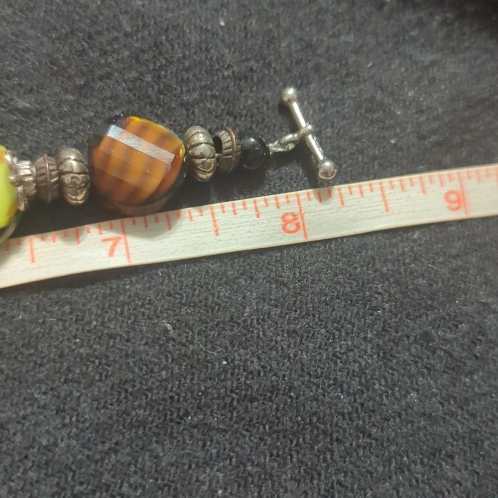 Silver Tone Black Green Orange Brown Swirl Glass Bead Statement Bracelet